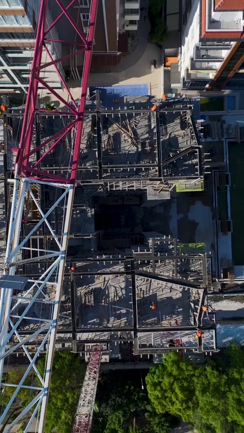 Vertical Video Construction Site Activity with Workers and Materials Stock Footage 341832835