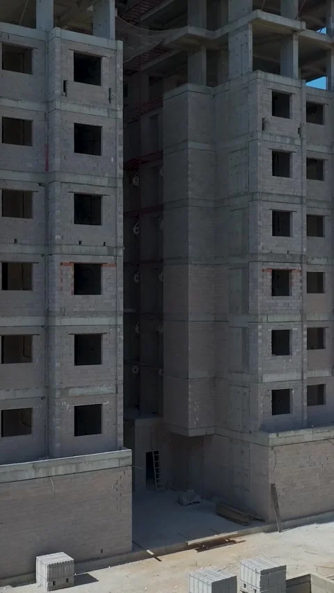 Vertical Video of Construction Team Building Residential House Video stock 342363185