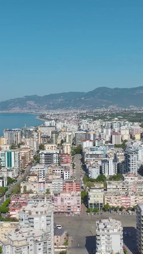 Vertical Video: Construction Team Installing Facades, Shaping Stone, and Stock Footage 297748026
