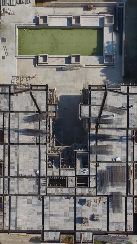 Vertical Video: Construction Workers Handling Metal, Stone, and Facade Materials Stock Footage 297747423