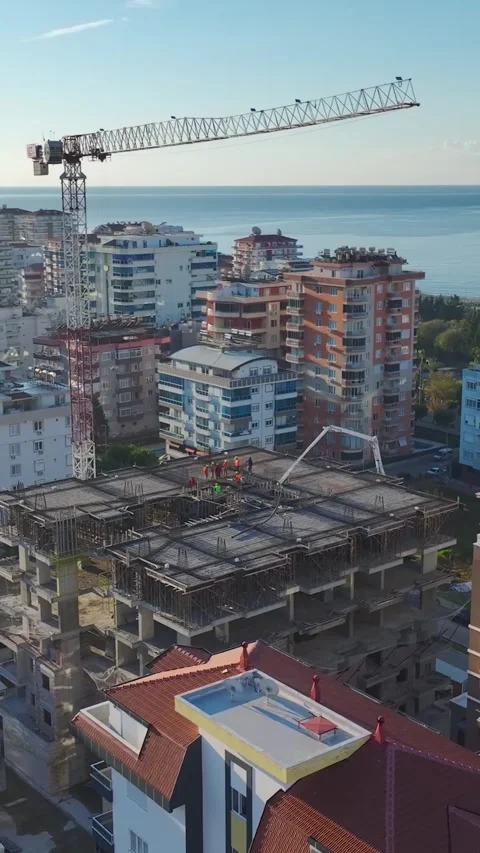 Vertical Video: Construction Workers Preparing Floors With Scaffolding and Tools Stock Footage 342566367