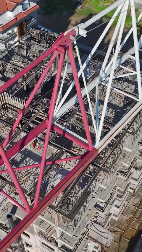Vertical Video: Construction Zone Captured Vertically with Workers Completing a Stock Footage 342696441