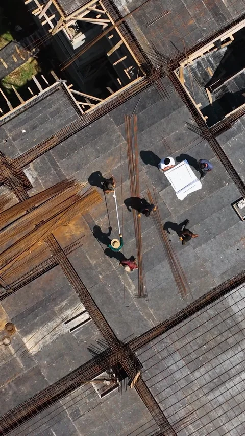 Vertical Video: Constructive Conversations - Aerial Footage of Architects and Video stock 245256764