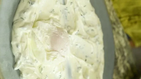 Vertical video. The cook serves a freshly prepared poached eggs. Video stock 311046147