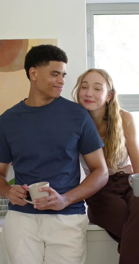 Vertical video: Couple at bar African American man turning after woman gazing Stock Footage 345219860