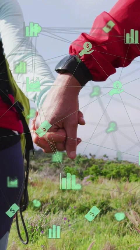 Vertical video: Couple holding hands walking coast wrist turning revealing watch Stock Footage 333542452