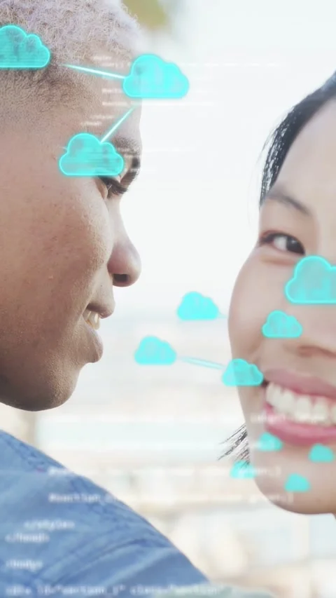 Vertical video: Couple smiling at rail, shot sparking teal overlay and code Stock Footage 333953852