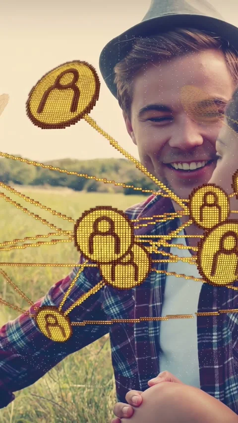 Vertical video: Couple touching hands in meadow, shiny nodes appearing over Vídeo Stock 337540691
