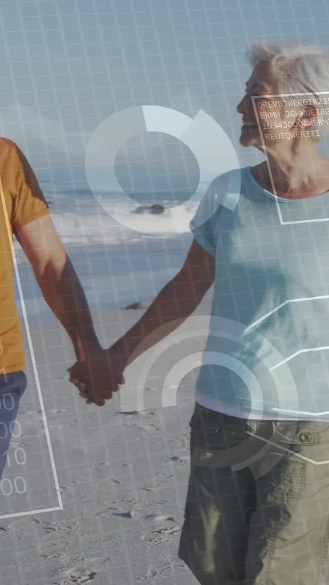 Vertical video: Couple walking hand-in-hand on beach as camera widening, 01 HUD Stock Footage 334297116