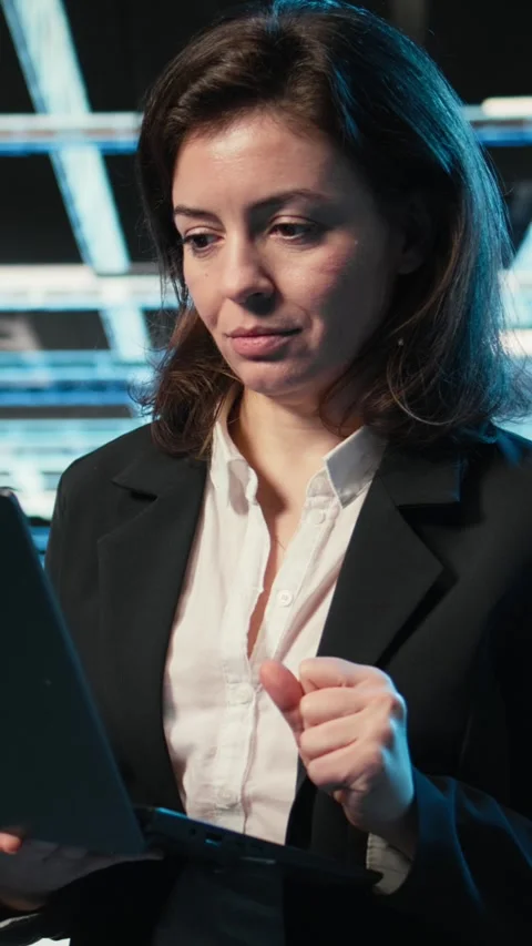 Vertical video Creating digital twin scan, laptop and admin in data center Stock Footage 329320444