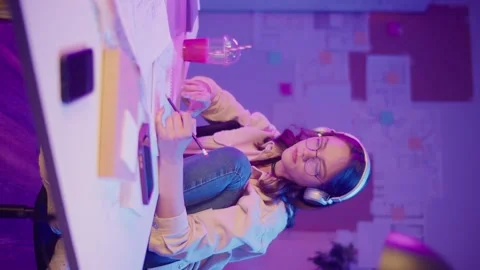 Vertical Video Creative Industries, Gen Z Focus. Teen Girl Works on Design or Stock Footage 307619819