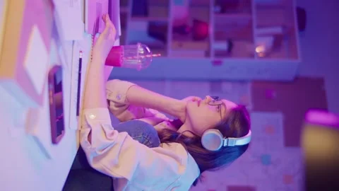 Vertical Video Creative Self-Discovery, Neon Mood. Teen Girl Focuses on Personal Stock Footage 307643399