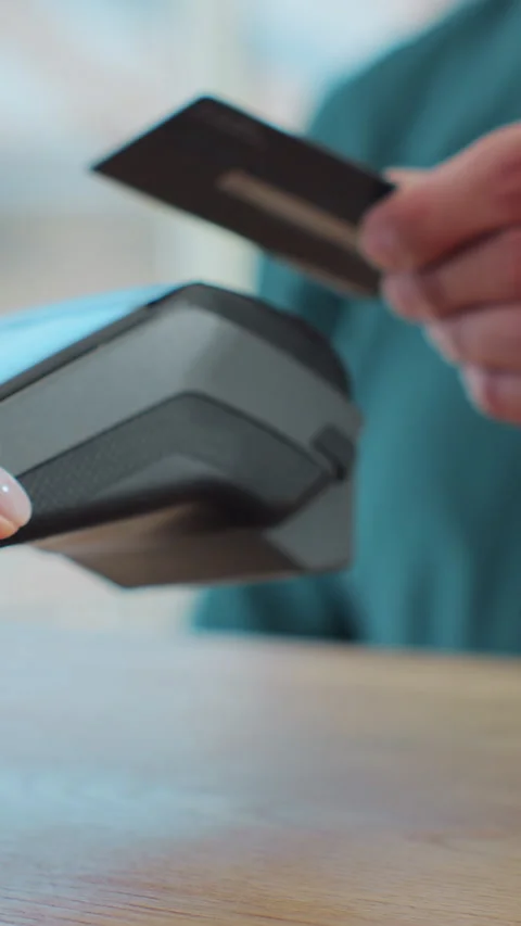 Vertical video. Credit card machine for money transaction. Stock Footage 343769070