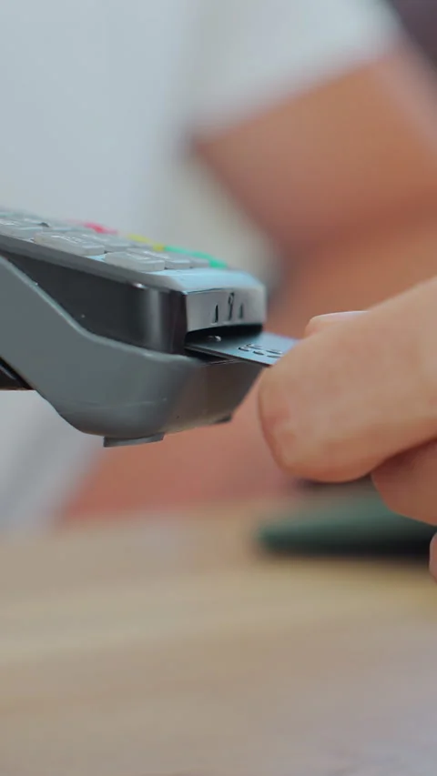 Vertical video. Credit card machine for money transaction. 動画素材 343771074