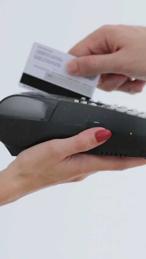 Vertical video. Credit card machine for money transaction. Stock Footage 345703261
