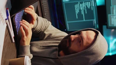 Vertical video: Criminal thief hacking password to break server interface Stock-Footage 221797156