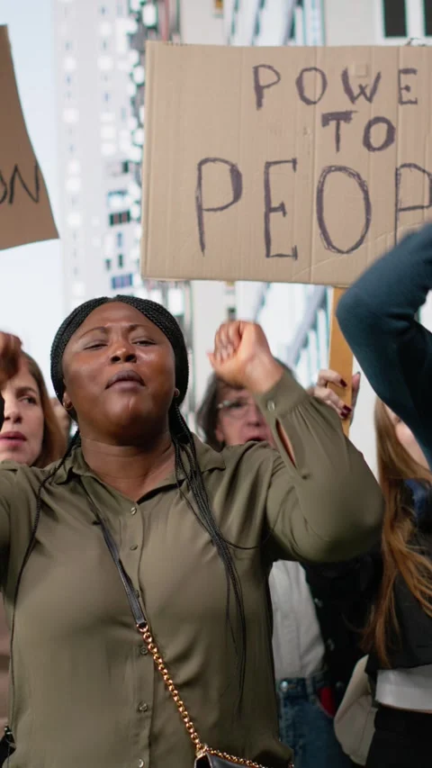 Vertical Video Crowd of people engaged in activism and revolt against corruption Stock Footage 327334008