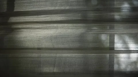 Vertical video. Curtains background on the window with shadows Stock Footage 247961975