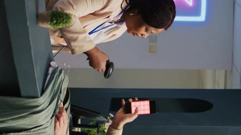 Vertical video Customer using loyalty program app Stock Footage 243226426