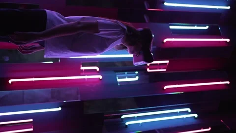 Vertical video - Cyber headset. Virtual reality technology. Person in the Neon Stock Footage 152692932