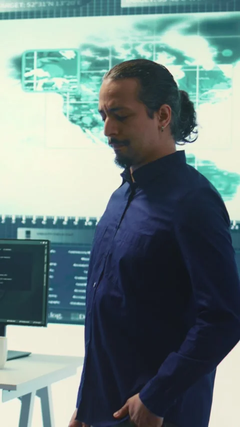 Vertical Video Cybersecurity team investigating cybercrime and malware attacks Stock Footage 277853520