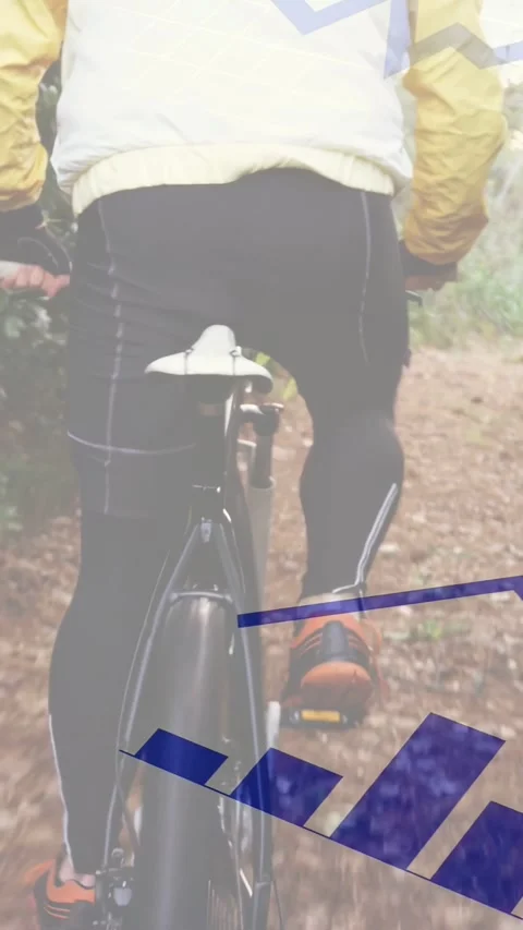 Vertical video: Cyclist taking first pedal on leaf trail, blue overlay showing Stock Footage 334297530