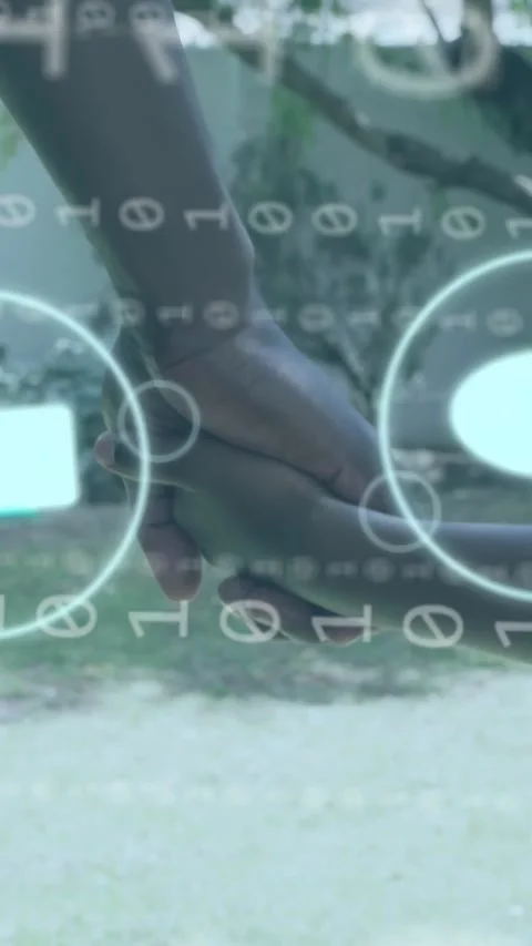 Vertical video: Dad and son holding and guiding path, handhold starting tech UI Stock Footage 333556739