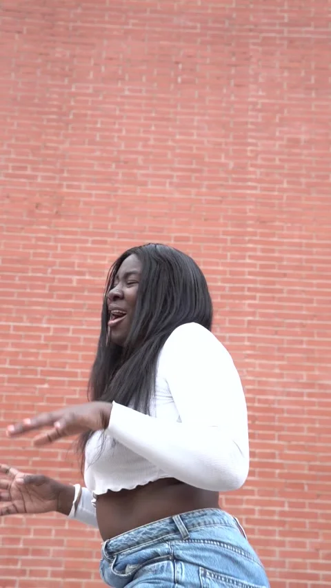 Vertical video of dancing young african american teen girl blogger recordin.. Stock Footage 265883274