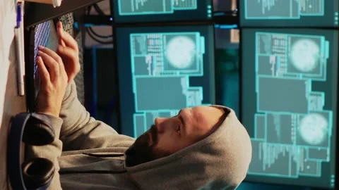 Vertical video: Dangerous programmer hac... | Stock Video | Pond5