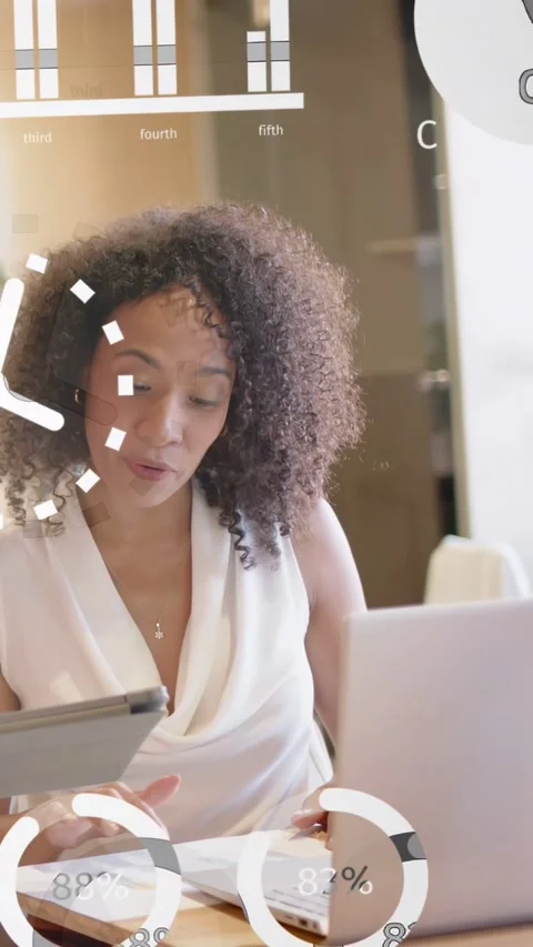 Vertical video: Data analyst tapping tablet and typing laptop starting 3D charts Stock Footage 333496678