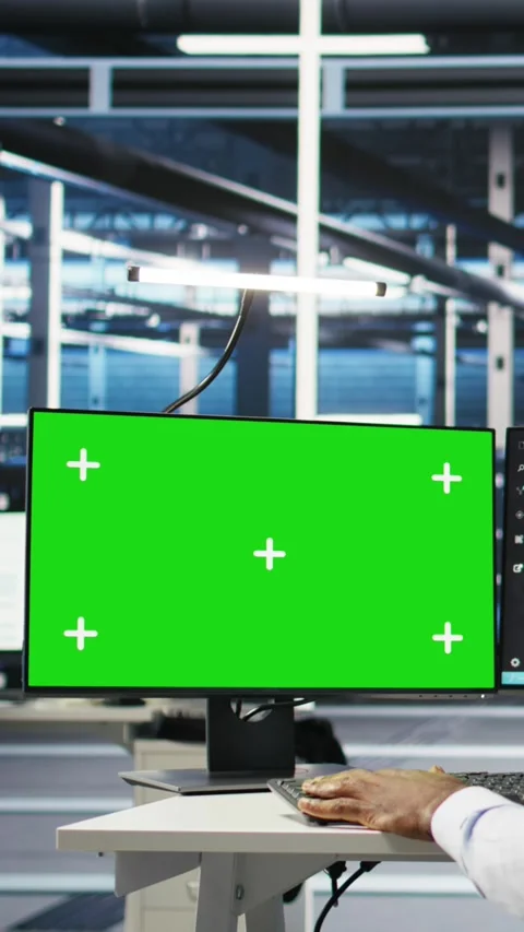 Vertical video Data center admin using green screen PC to do node tree Stock Footage 308756857