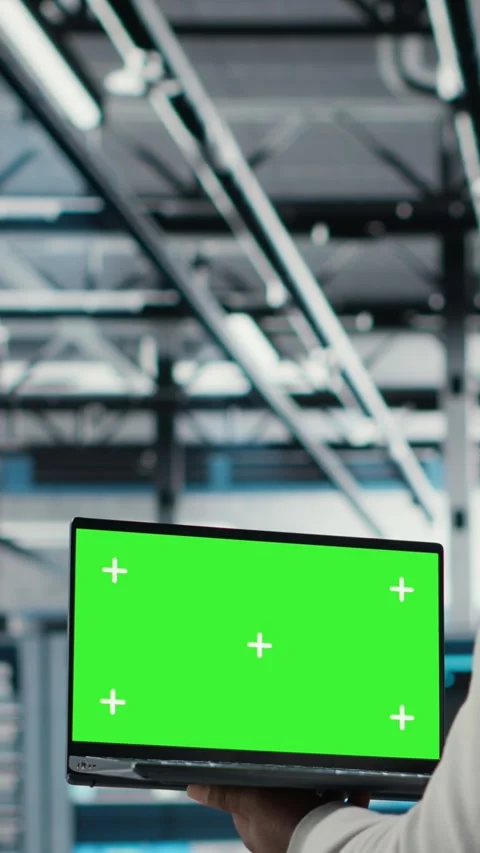 Vertical video Data center admin using isolated screen laptop to monitor neural Stock Footage 311547999