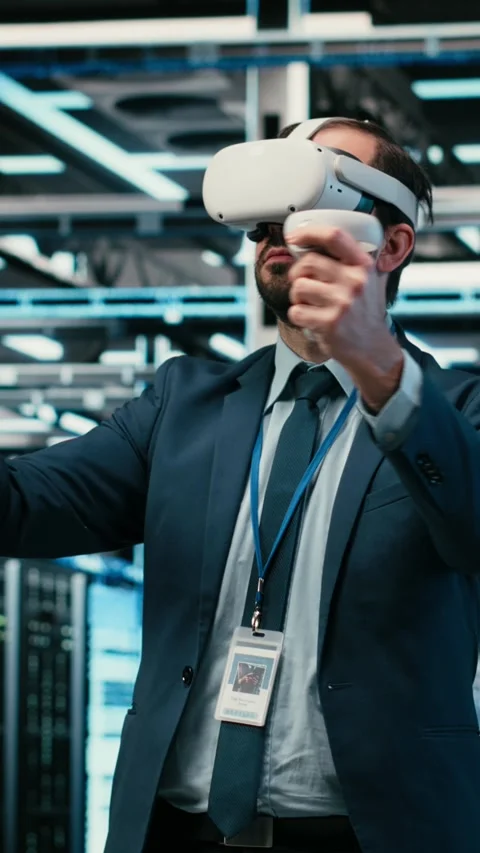 Vertical video Data center admin using virtual reality simulation technology to Stock Footage 329944172