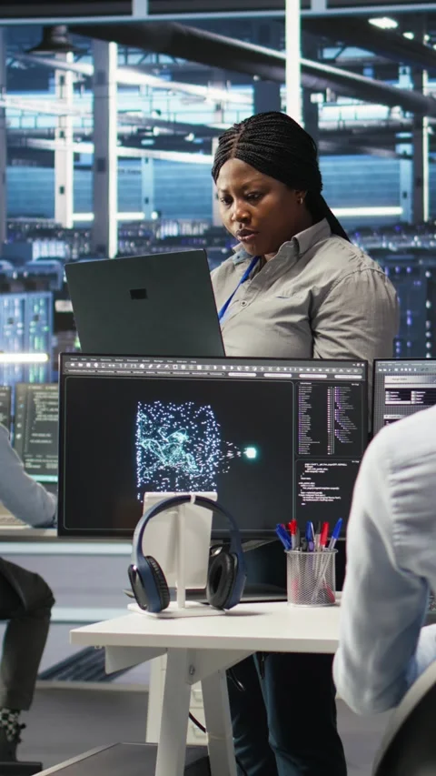Vertical video Data center computer scientists use node tree programming to Stock Footage 307969969