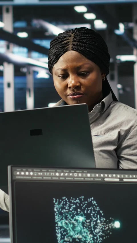 Vertical video Data center computer scientists use node tree programming to Stock Footage 307970923