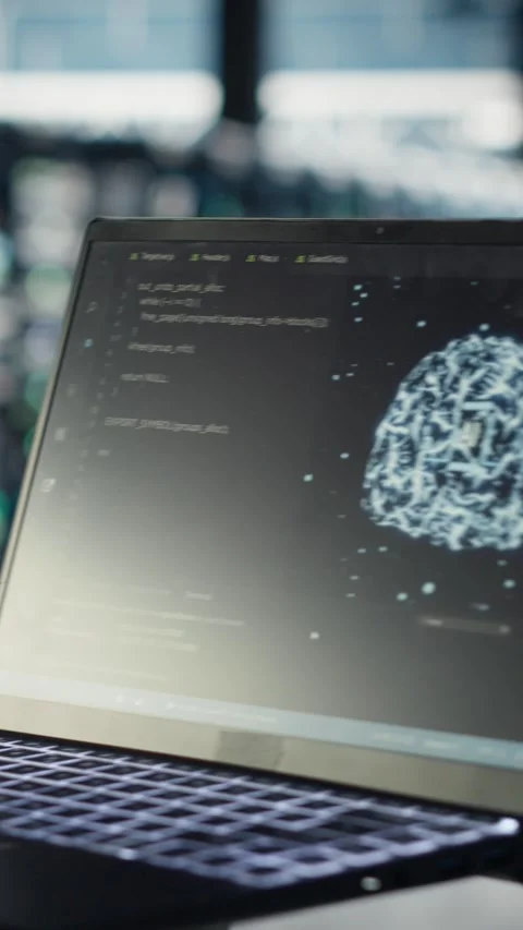 Vertical video Data center computer scientist doing AI data analysis on laptop Stock Footage 316860680