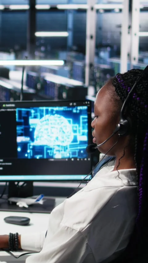 Vertical video Data center developer using AI assistant to provide user Stock Footage 313456870