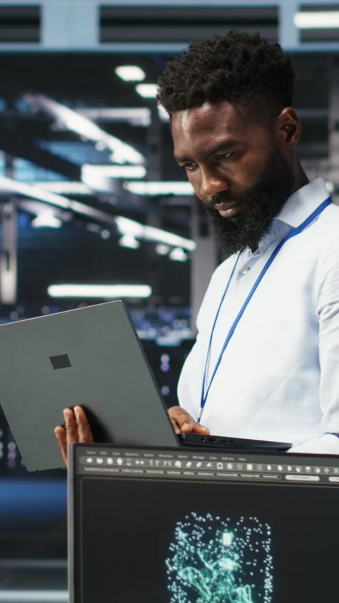 Vertical video Data center engineer does node tree programming to optimize Stock Footage 307968844