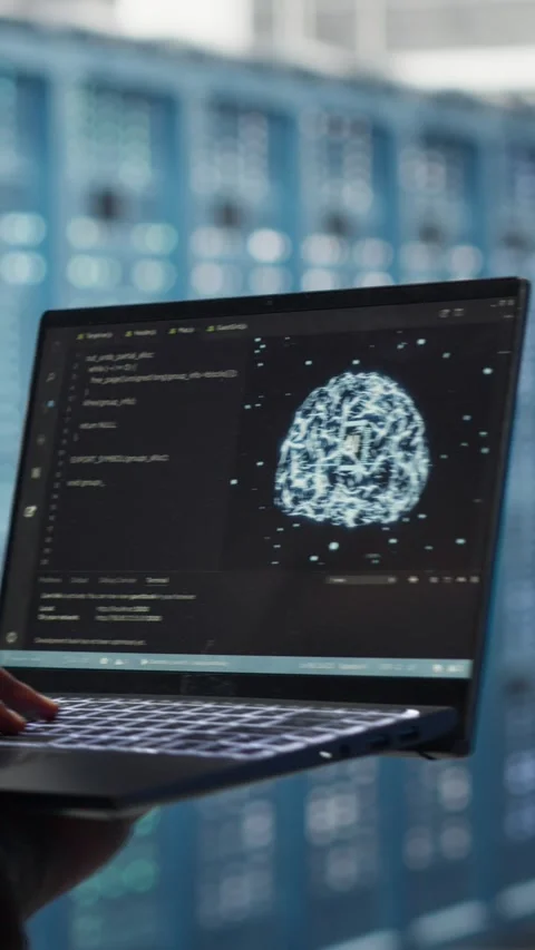 Vertical video Data center engineer doing AI data analysis on laptop to upgrade Stock Footage 316862320
