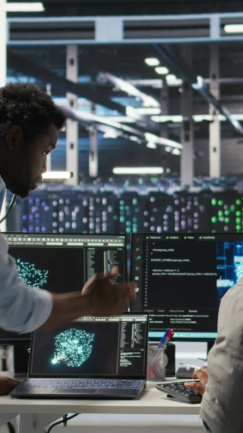 Vertical video Data center engineering team uses artificial intelligence deep Stock Footage 307970491