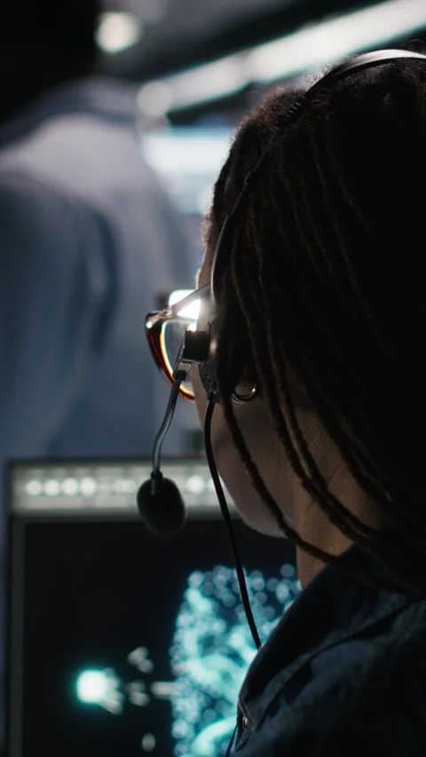 Vertical video Data center expert examines node tree interface, delivering Video stock 307971381