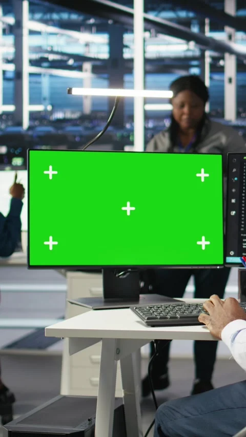 Vertical video Data center IT expert uses green screen PC to apply deep learning Stock Footage 308755752