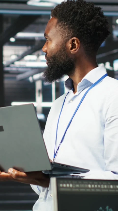 Vertical video Data center programmer uses node tree software to identify Stock Footage 307969744