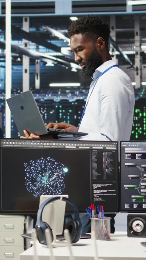 Vertical video Data center programmer uses node tree software to identify Video stock 308753022