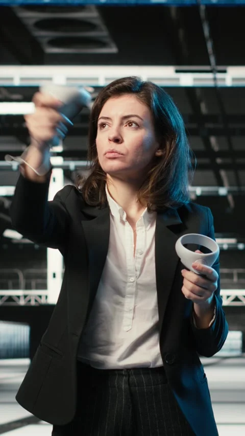 Vertical video Data center programmer using VR equipment to create digital twin Stock Footage 329322754