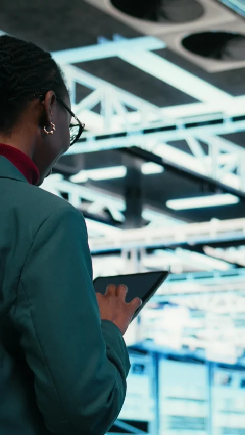 Vertical video Data center programmer writing code for resource optimization Video stock 329713777