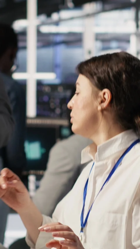 Vertical video Data center software developer using PC to monitor neural Stock Footage 309253927