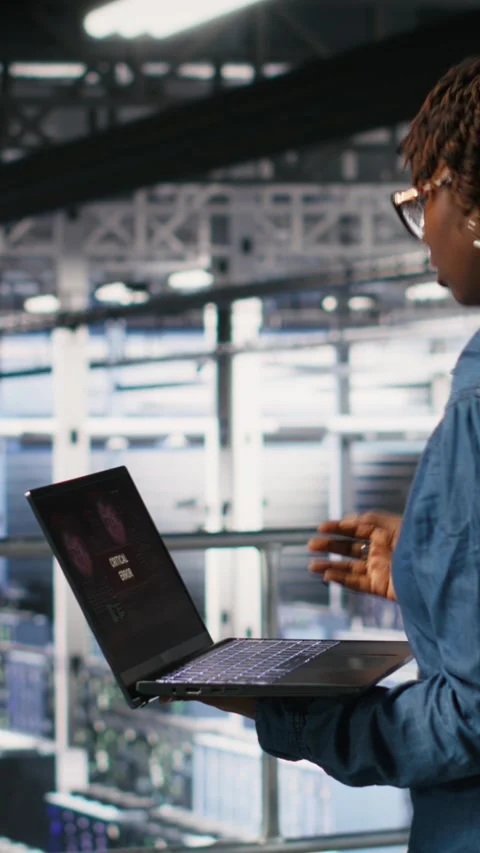 Vertical video Data center software developer panicking after receiving critical Stock Footage 310771801