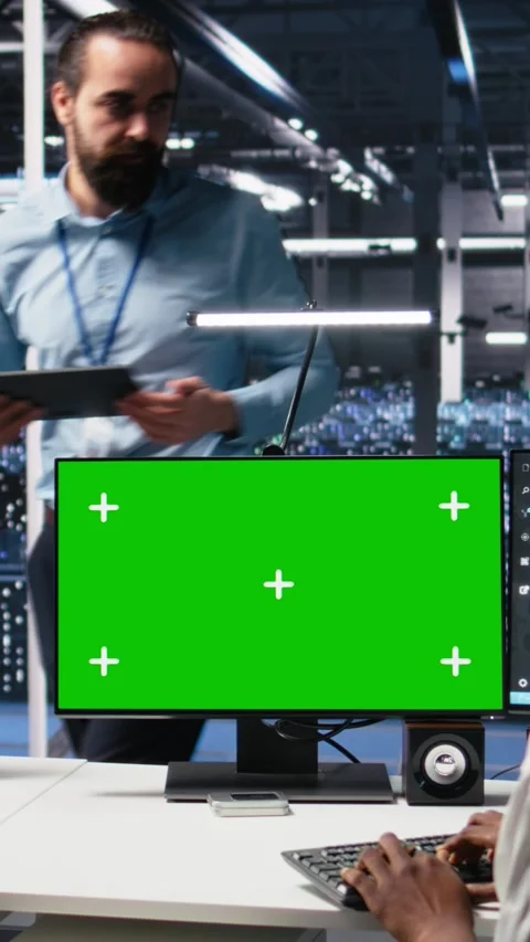 Vertical video Data center software developer managing AI systems using green Stock Footage 313507190