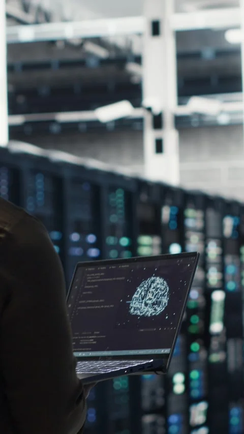 Vertical video Data center software developer using deep learning tech to Stock Footage 316860972